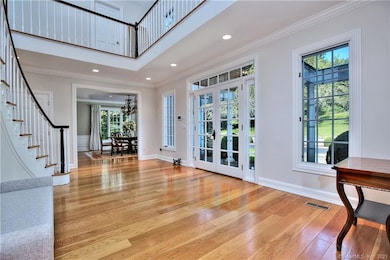Bright & airy, this Foyer sets the tone for how bi