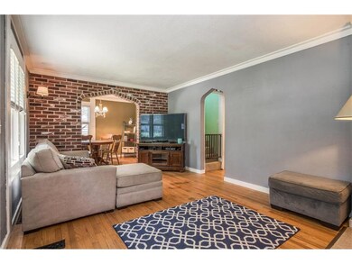 The hardwood main living room is to your left, fea