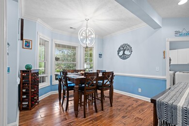 Dining room featuring a healthy amount of sunlight
