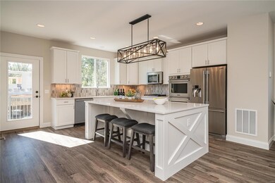Stunning Kitchen with Large Center Island with Sea