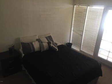 Bedroom 1 with Door to Patio