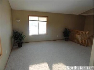 Living Room with a vaulted ceiling and updated car