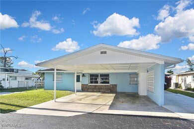 View of front facade with concrete driveway, a fro