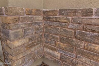 Front exterior stone detail 7341 E Mark