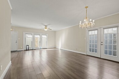 THIS CORNER UNIT IS SPACIOUS, LIGHT AND BRIGHT!