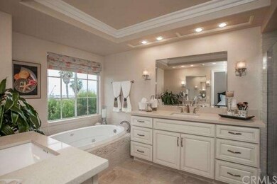 Enjoy relaxing spa tub in remodeled MBR.