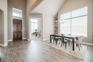 The wide foyer opens up to a spacious dining area.