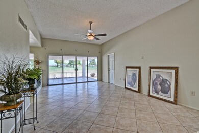 LIVING ROOM WITH DOOR TO BACK PATIO