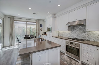 Kitchen has stainless steel Bosch appliances
