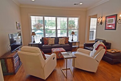 The Living Room has a great view of the pool & pat