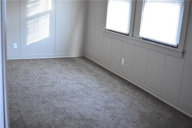 Bedroom with new carpeting