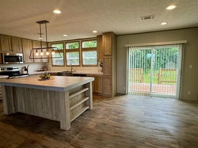 Kitchen with appliances with stainless steel finis