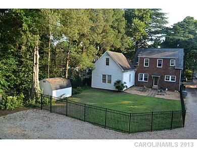 Yard/Garden - Rear fenced yard and parking area ga