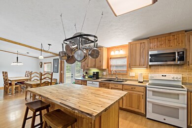 View of kitchen looking towards dining area which