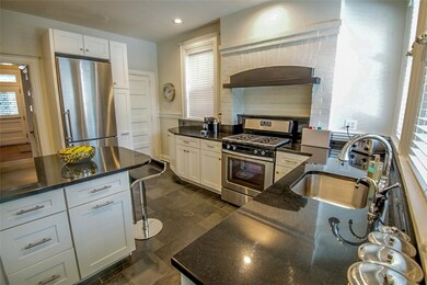 Kitchen - Stainless appliances, heated tile floor,