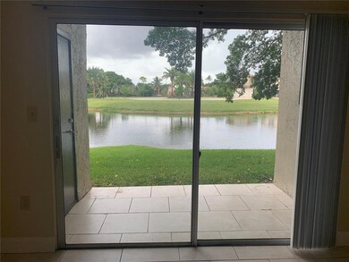 Beautiful tiled patio overlooks peaceful view of t