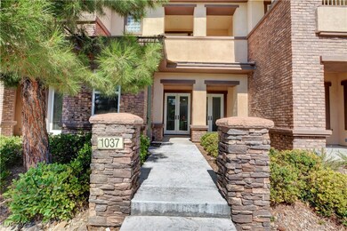 Property entrance featuring brick, stone and 2 sets of French doors.  Front door is on the left.