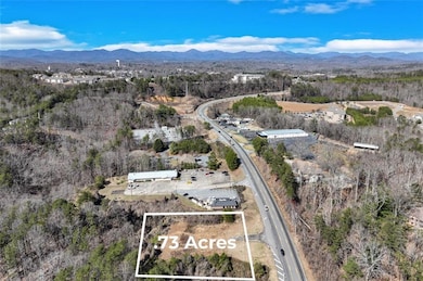 Drone / aerial view featuring a mountain view