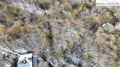 Driveway off Charter Hills shown by red arrow.  Ho
