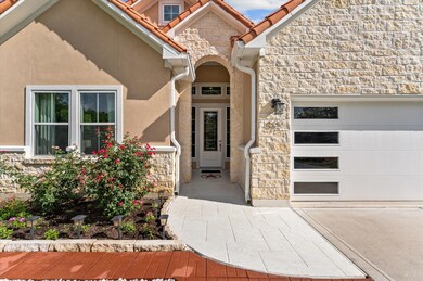 Charming home with a blend of stone and stucco ext