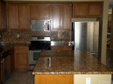 Plenty of counter-space and room to work in this k
