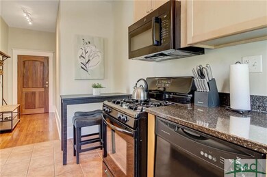 Kitchen view including   dining area & foyer