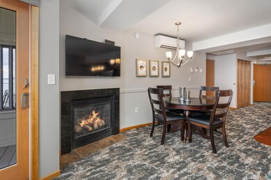Dining room featuring beam ceiling, an inviting ch