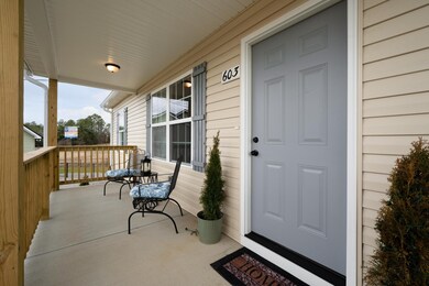 Inviting covered front porch with lovely curb appeal! 603 Anna's Way Lewisburg, TN 37091