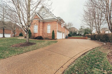 Gorgeous landscaping surrounds this custom built home.