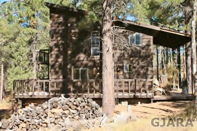 Cabin view from North to South. Wrap aroun deck