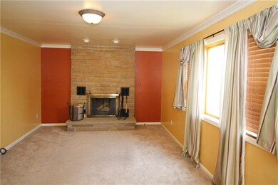 Large Living Room w/ Stone Log Burning Fireplace f