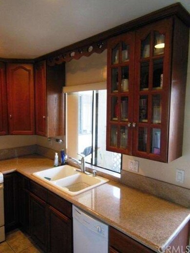 Granite Counter top and window to balcony for BBQ'