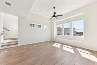 Unfurnished living room with light wood-style flo