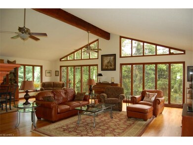 Great Room is surrounded with windows.