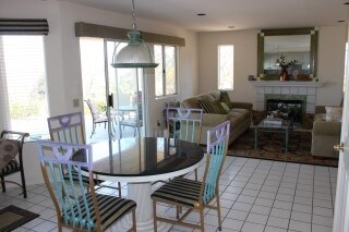 Large family room off the kitchen/dinette area--all are open to each other and lots of windows to back of home and views.
