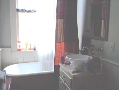 Bath. Full downstairs bathroom with a clawfoot tub