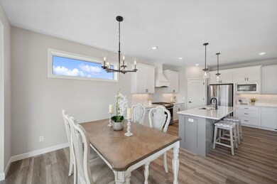 Dining Area - image is of a former model home for visual purposes.