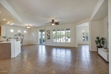Tile floors and plantation Shutters.