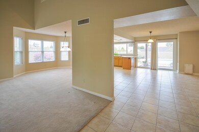 Formal dining next to open kitchen