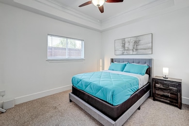 Cozy first-floor bedroom with natural light and mo