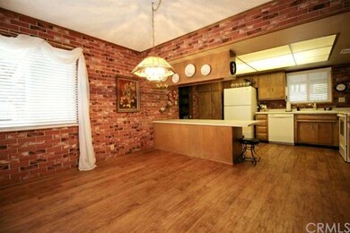 Spacious eat-in kitchen with large breakfast bar, 