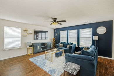 Cozy and stylish living area with rich wood-look f