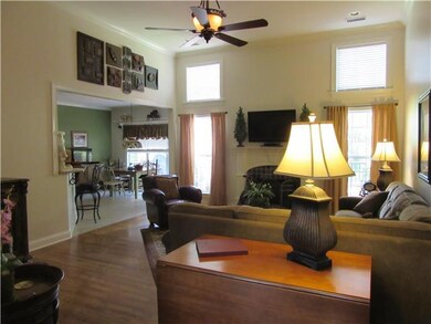 Huge livng room with fire place, soaring ceiling - open to kitchen for optimal entertaining!