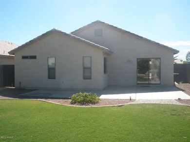 Lush Back Yard with Large Patio Area