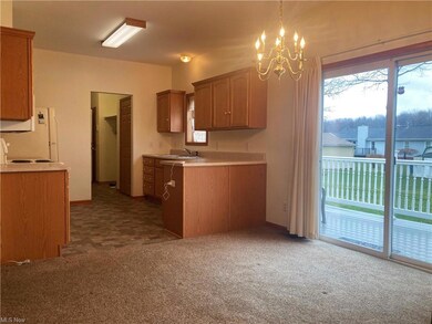 Dining area with sliding doors to spacious deck