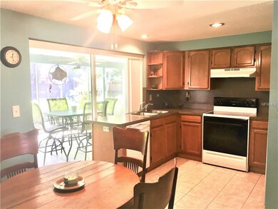 Dining room and kitchen w/ pocket slider to lanai.