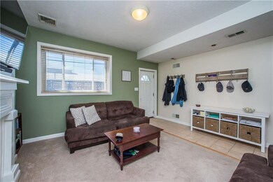 The living room (measuring a generous 16x15) gets 