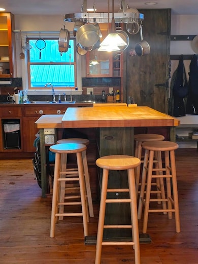 Kitchen view with back to dining area