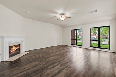 Large Den w/ Fireplace