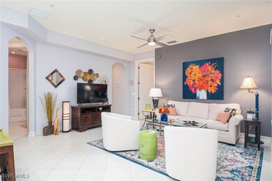 Tiled living room with ceiling fan